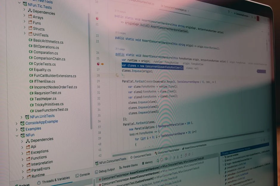 A modern computer screen displaying web design work, showcasing creative visuals in a workspace.